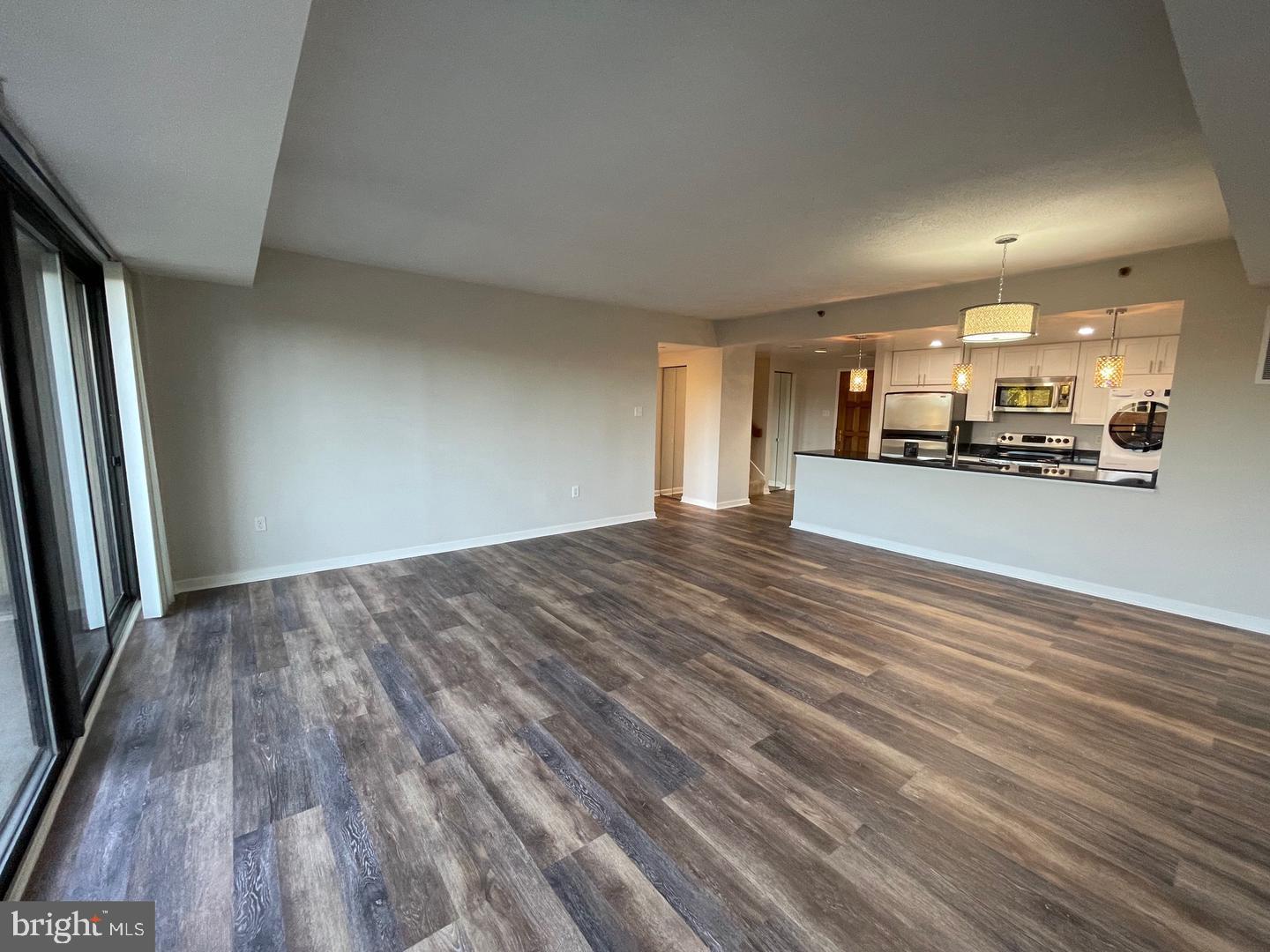 1530 Key Boulevard, Unit 326 Arlington, VA 22209 - Photo 19 of 47 a view of a livingroom with furniture and wooden floor