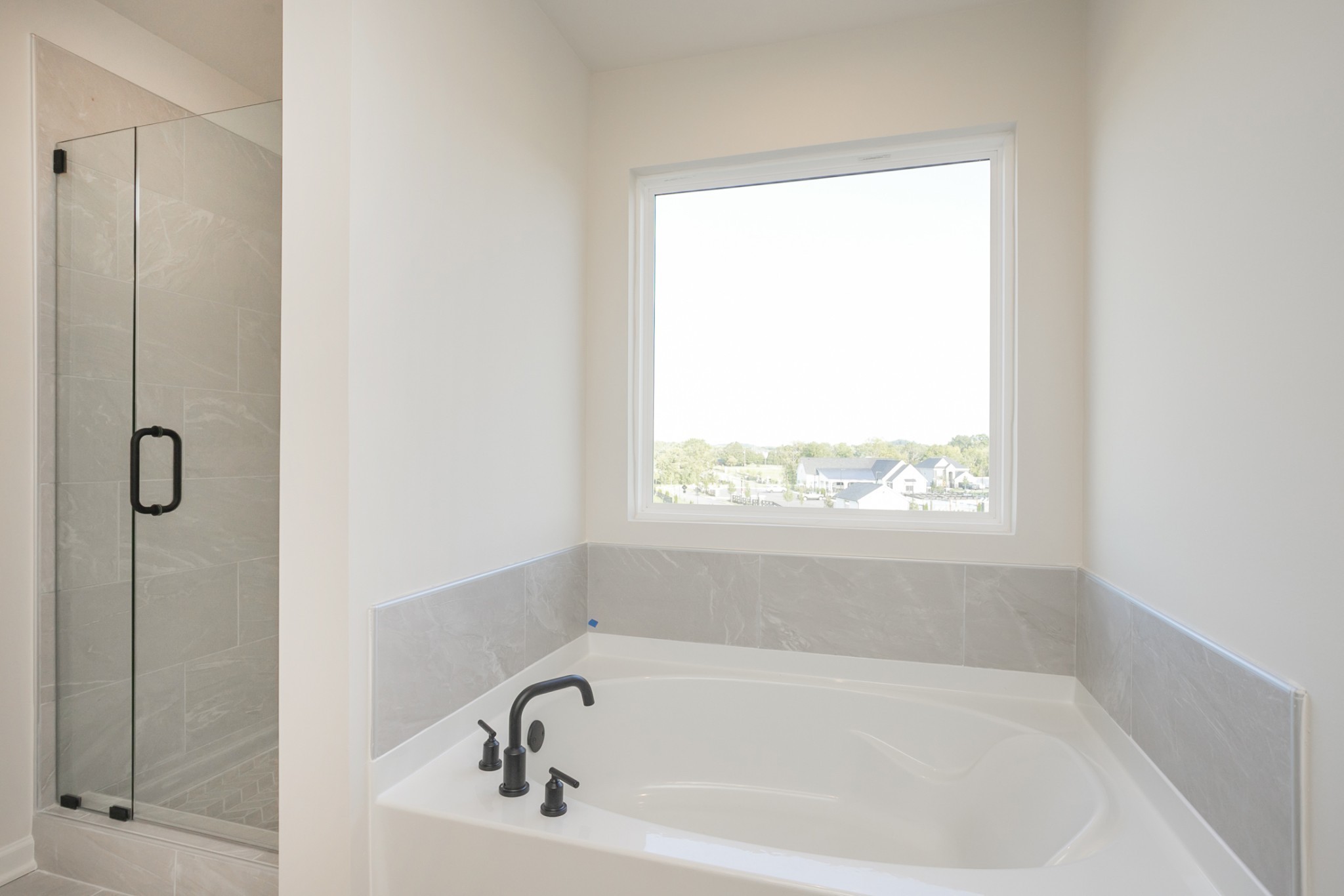 940 Pleasant Ridge Run Mount Juliet, TN 37122 - Photo 25 of 32 a white bath tub sitting next to a window