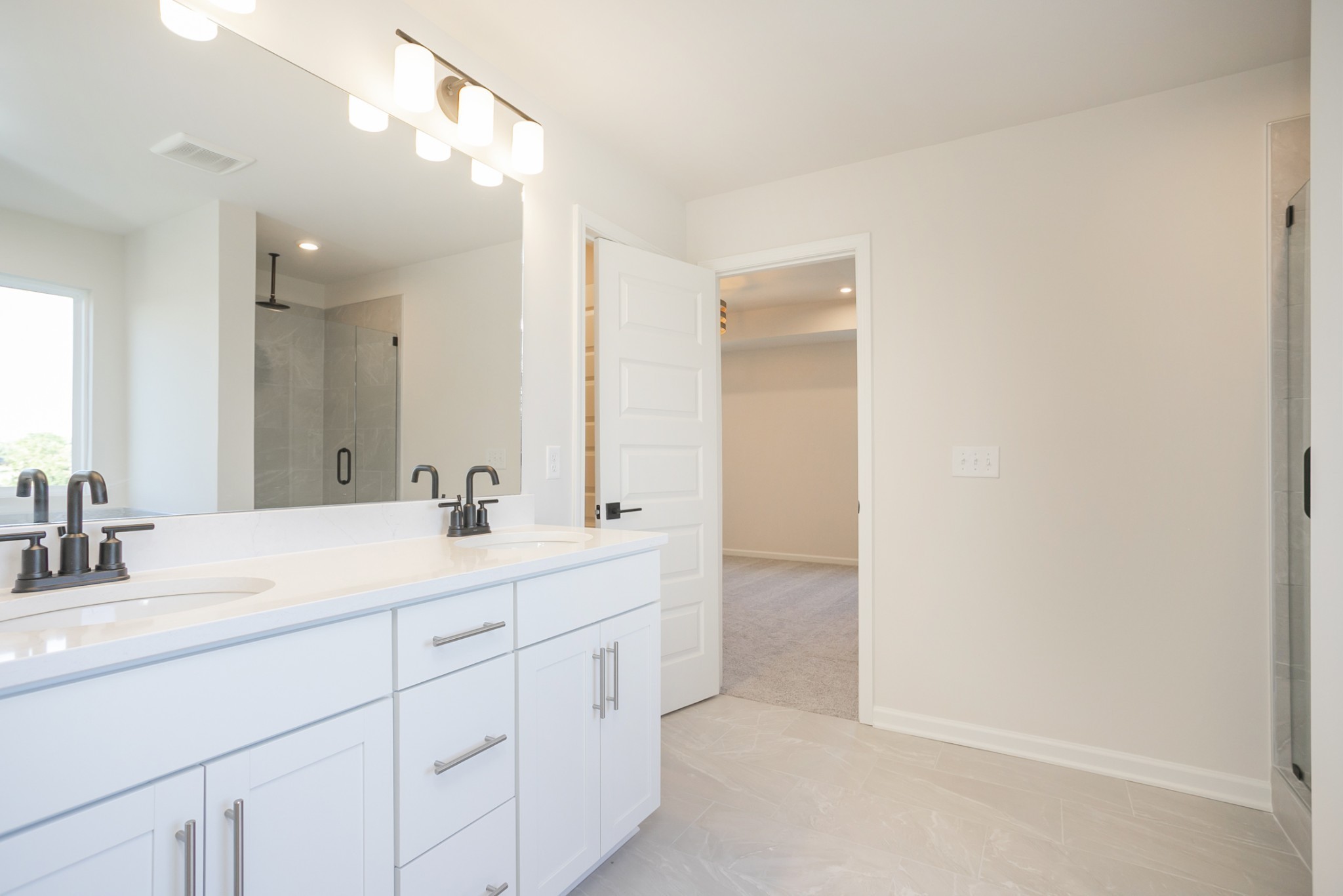940 Pleasant Ridge Run Mount Juliet, TN 37122 - Photo 26 of 32 a bathroom with a sink and a mirror