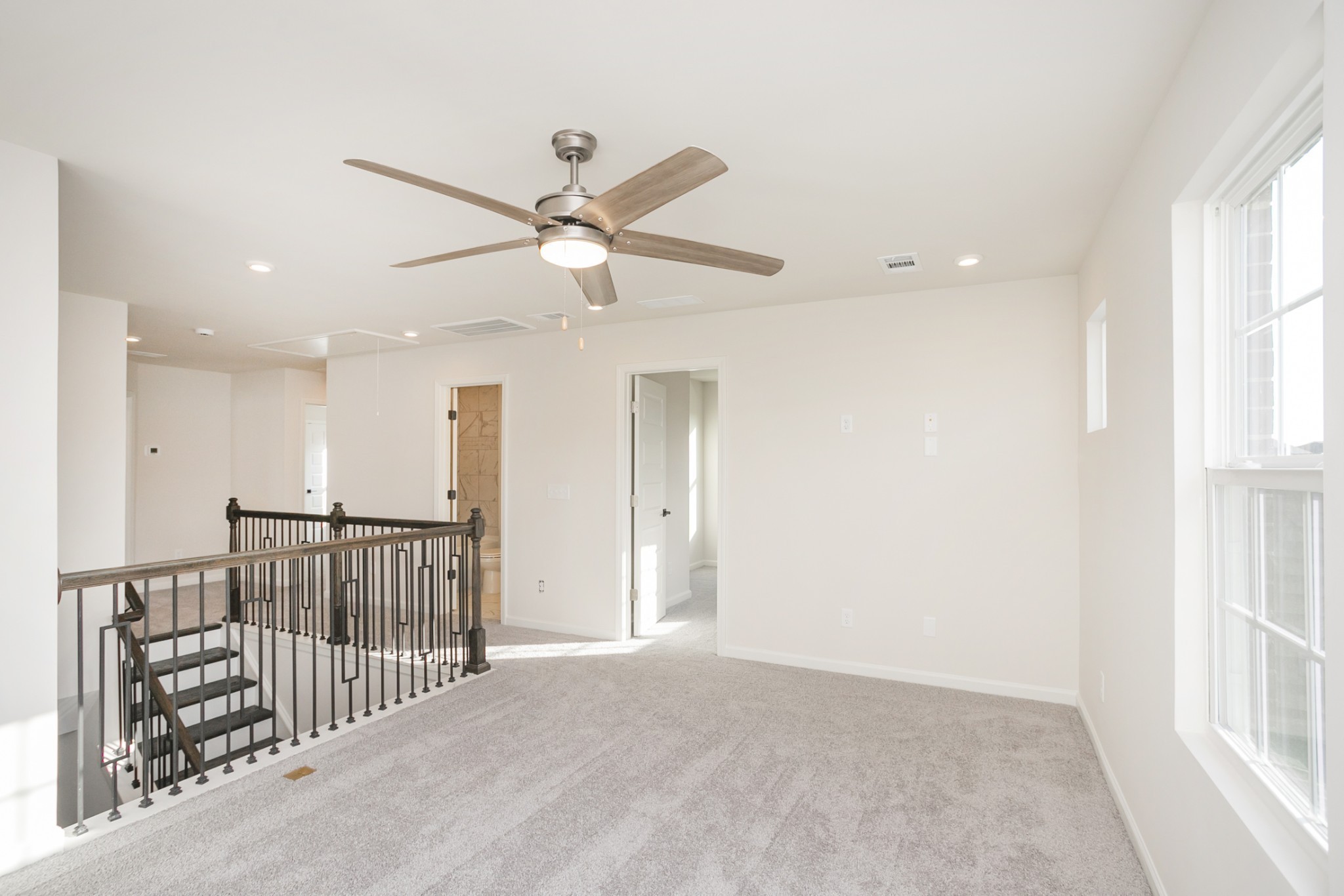 940 Pleasant Ridge Run Mount Juliet, TN 37122 - Photo 28 of 32 a view of a hallway with a ceiling fan