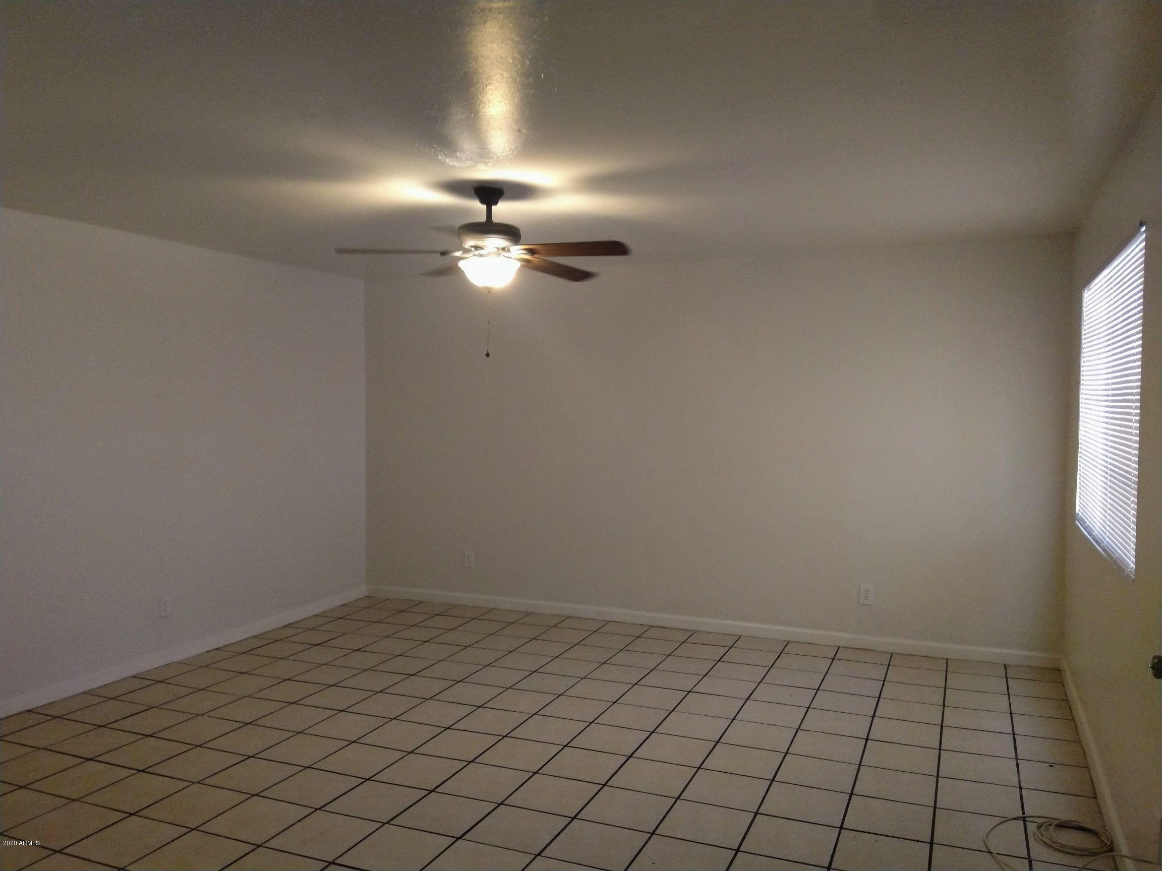 2133 West Adams Street, Unit 3 Phoenix, AZ 85009 - Photo 5 of 10 a view of an empty room and window