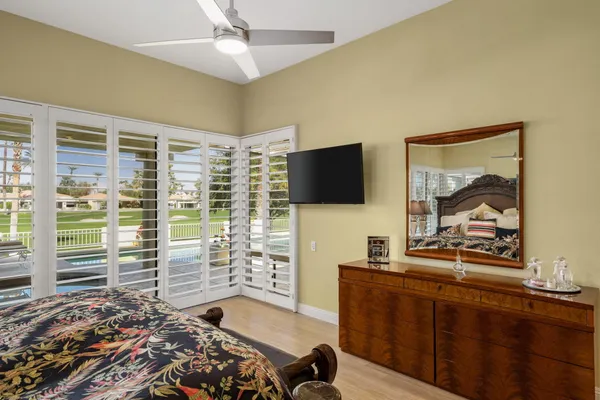 a room with furniture and flat screen tv