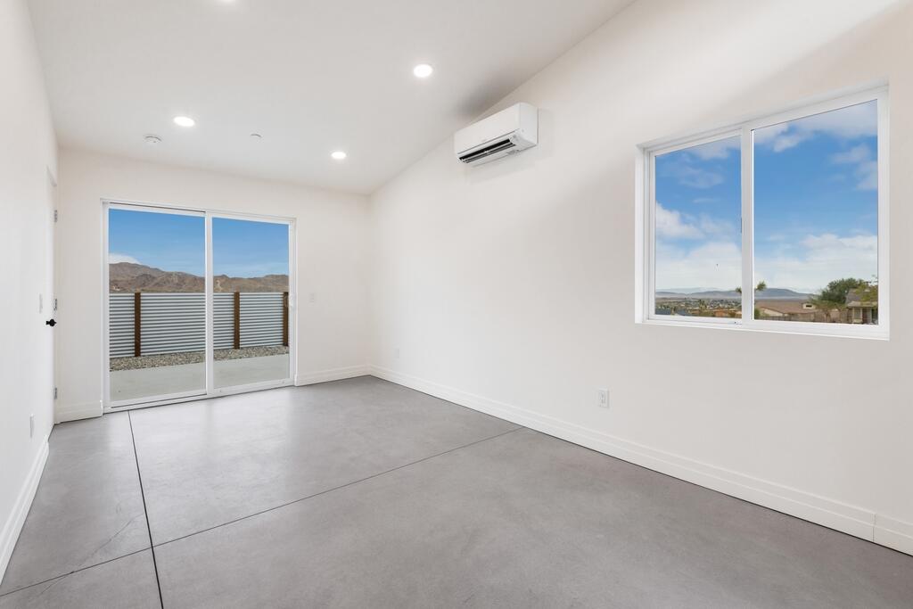 6689 Torres Avenue Joshua Tree, CA 92252 - Photo 23 of 48 a view of an empty room with a window