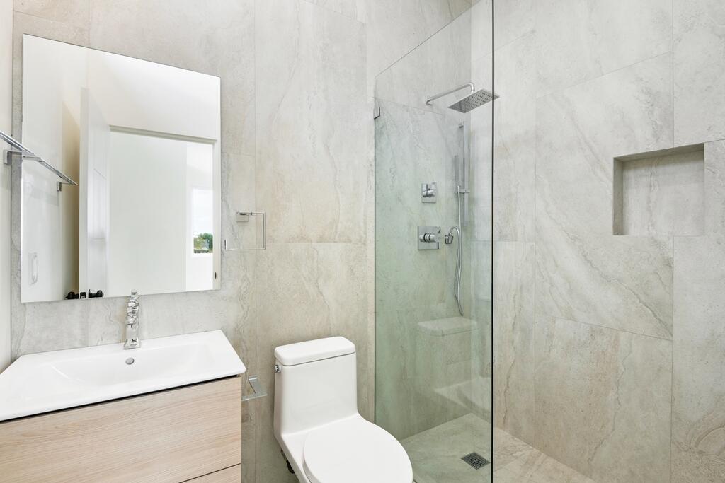 6689 Torres Avenue Joshua Tree, CA 92252 - Photo 25 of 48 a bathroom with a sink toilet and shower