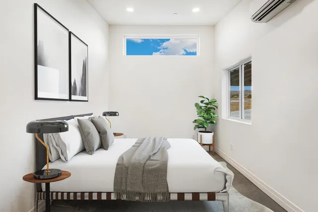 a view of an empty room with closet