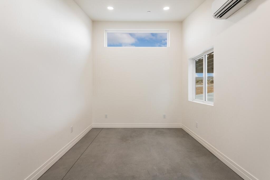6689 Torres Avenue Joshua Tree, CA 92252 - Photo 28 of 48 an empty room with a window