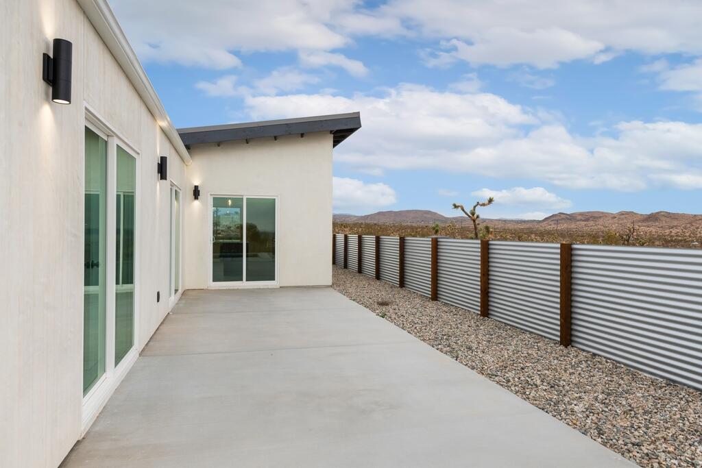 6689 Torres Avenue Joshua Tree, CA 92252 - Photo 34 of 48 a view of a terrace with a garden