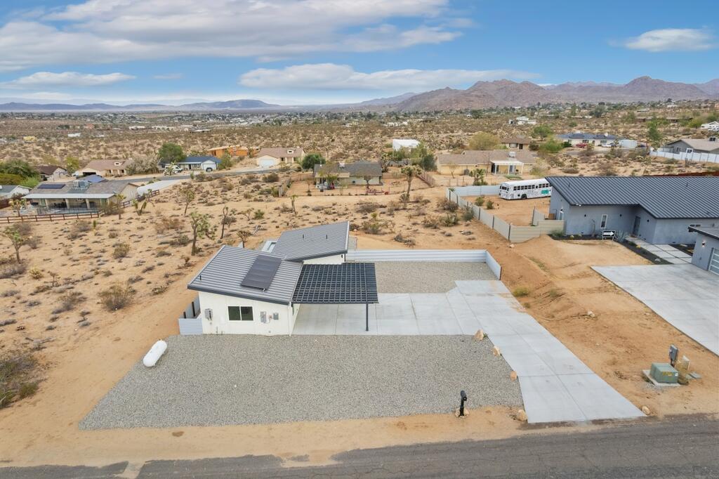 6689 Torres Avenue Joshua Tree, CA 92252 - Photo 43 of 48 an aerial view of residential houses with outdoor space