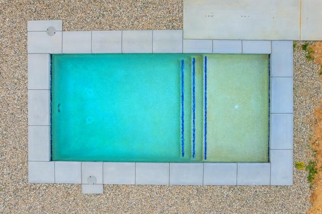 6689 Torres Avenue Joshua Tree, CA 92252 - Photo 47 of 48 a view of a kitchen with a fridge and an entryway