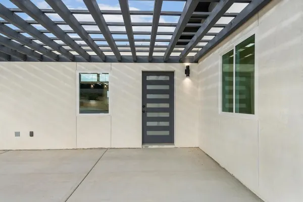 a kitchen with stainless steel appliances a refrigerator sink and stove