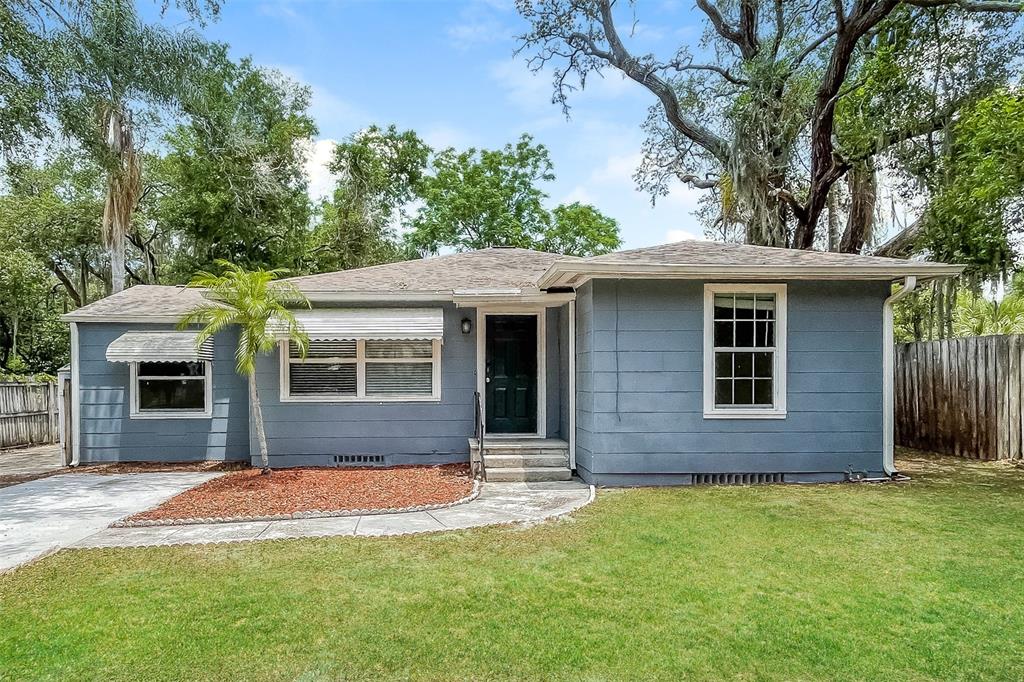 Restricted Address Clearwater, FL 33756 - Photo 1 of 1 a front view of a house with a yard