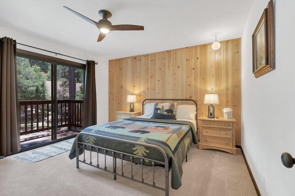 54495 South Circle Drive Idyllwild, CA 92549 - Photo 20 of 65 a bedroom with a bed next to a window