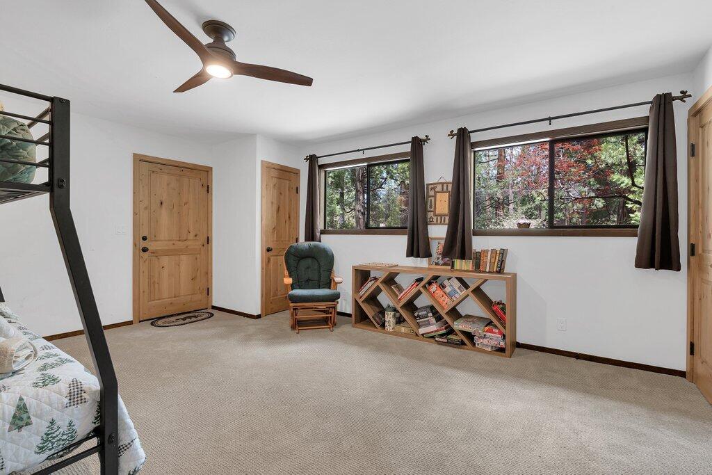 54495 South Circle Drive Idyllwild, CA 92549 - Photo 35 of 65 a bed room with furniture and a window