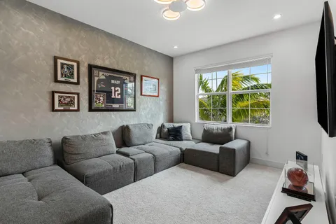 a spacious bathroom with a sink a large mirror and a bathtub