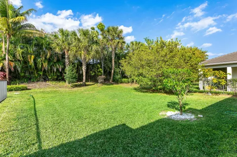 an aerial view of multiple houses with outdoor space