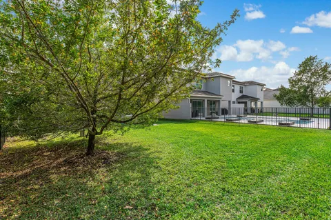 an aerial view of residential house with outdoor space