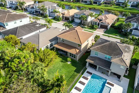 a living room with furniture flat screen tv and window