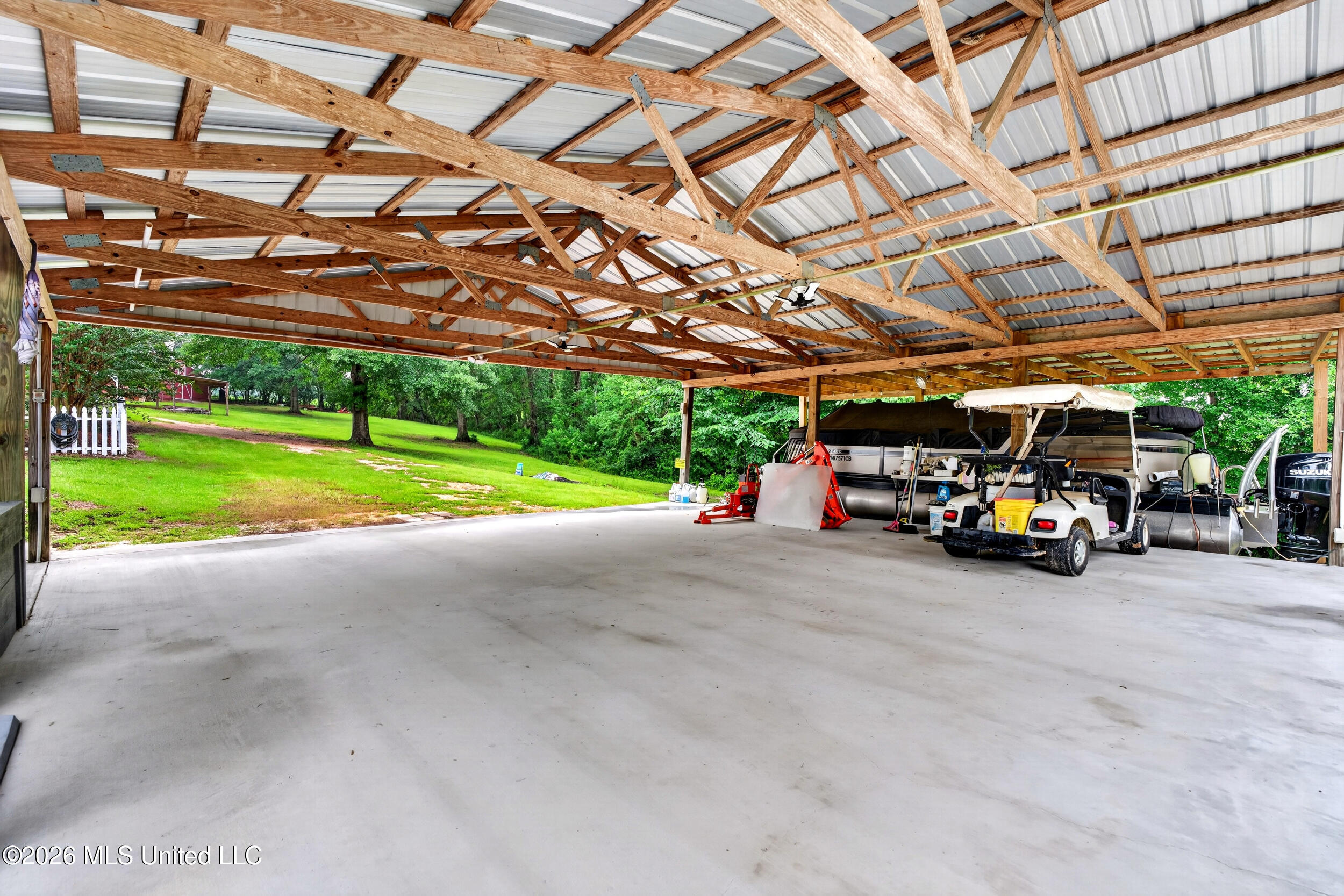 219 Pop Hill Road, Unit B Poplarville, MS 39470 - Photo 8 of 74 8_08_carport