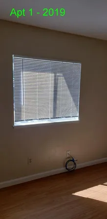 a view of a room with a window