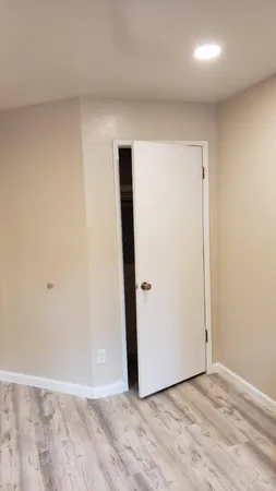 a kitchen with stainless steel appliances a refrigerator and a stove top oven