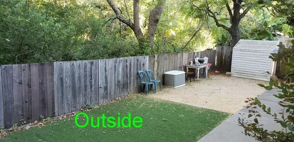 a view of a wooden fence