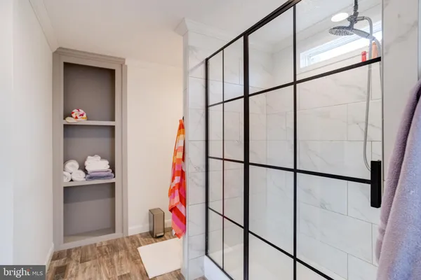 a bathroom with a sink and mirror
