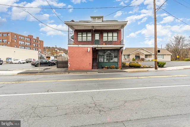 a front view of a building with street