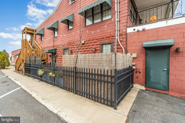 a view of a building with brick wall