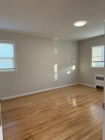 a view of an empty room and window