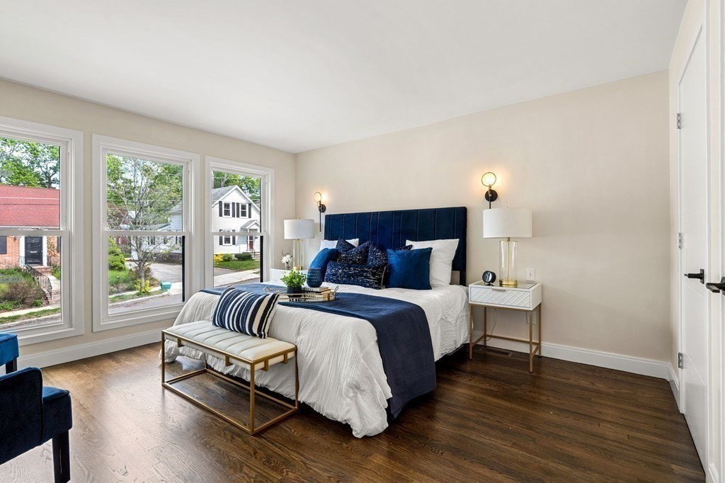 84 School Street Melrose, MA 02176 - Photo 22 of 34 a bedroom with bed and a large window