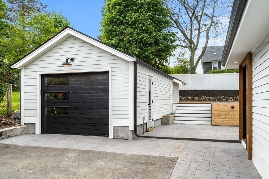 84 School Street Melrose, MA 02176 - Photo 34 of 34 a view of a house with a door and wooden walls