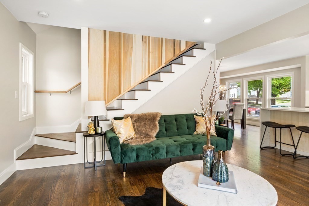 84 School Street Melrose, MA 02176 - Photo 7 of 34 a view of entryway and hall with wooden floor