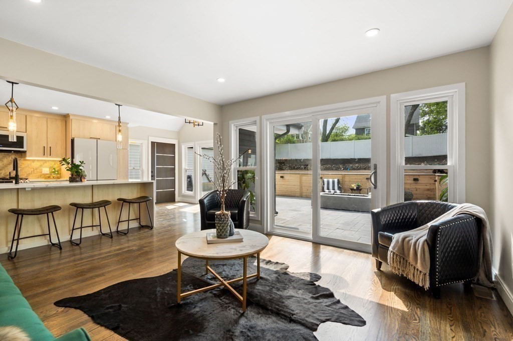 84 School Street Melrose, MA 02176 - Photo 8 of 34 a living room with furniture and a table