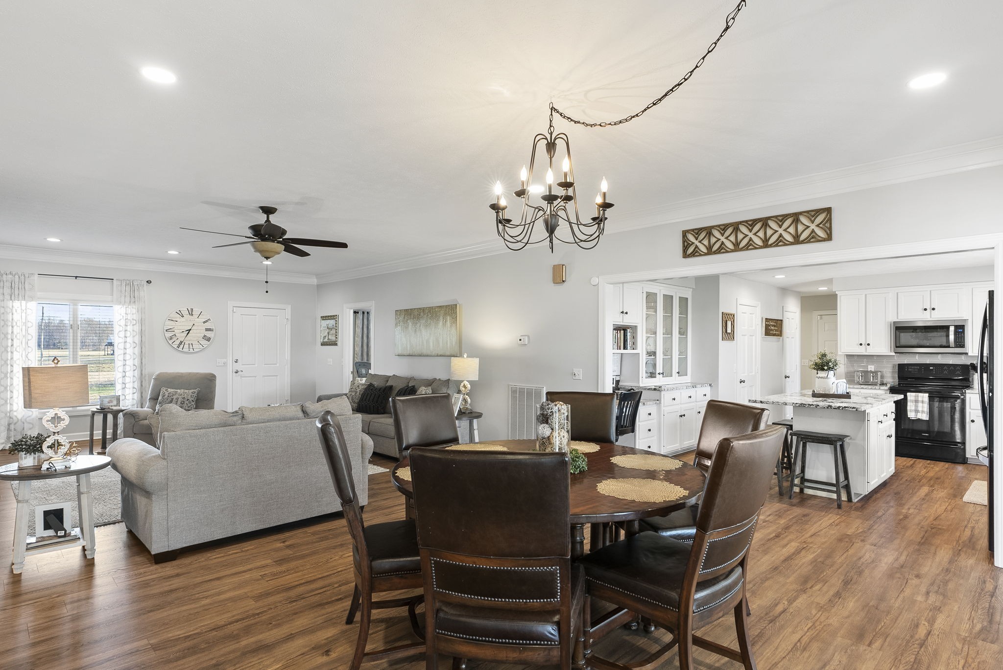 4767 Barren Plains Road Springfield, TN 37172 - Photo 23 of 68 a view of a dining room with furniture wooden floor and chandelier