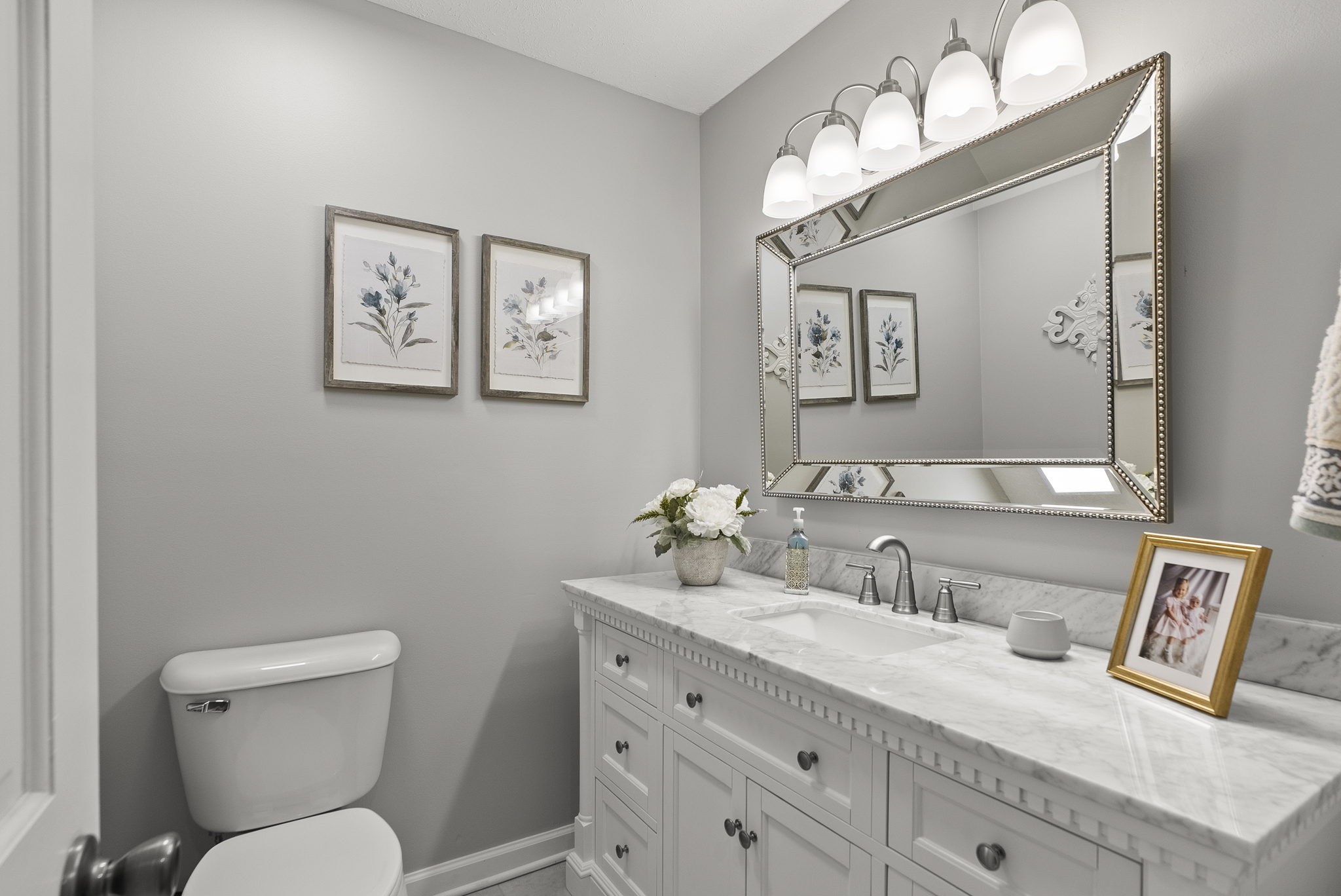 4767 Barren Plains Road Springfield, TN 37172 - Photo 33 of 68 a bathroom with a toilet a sink and mirror
