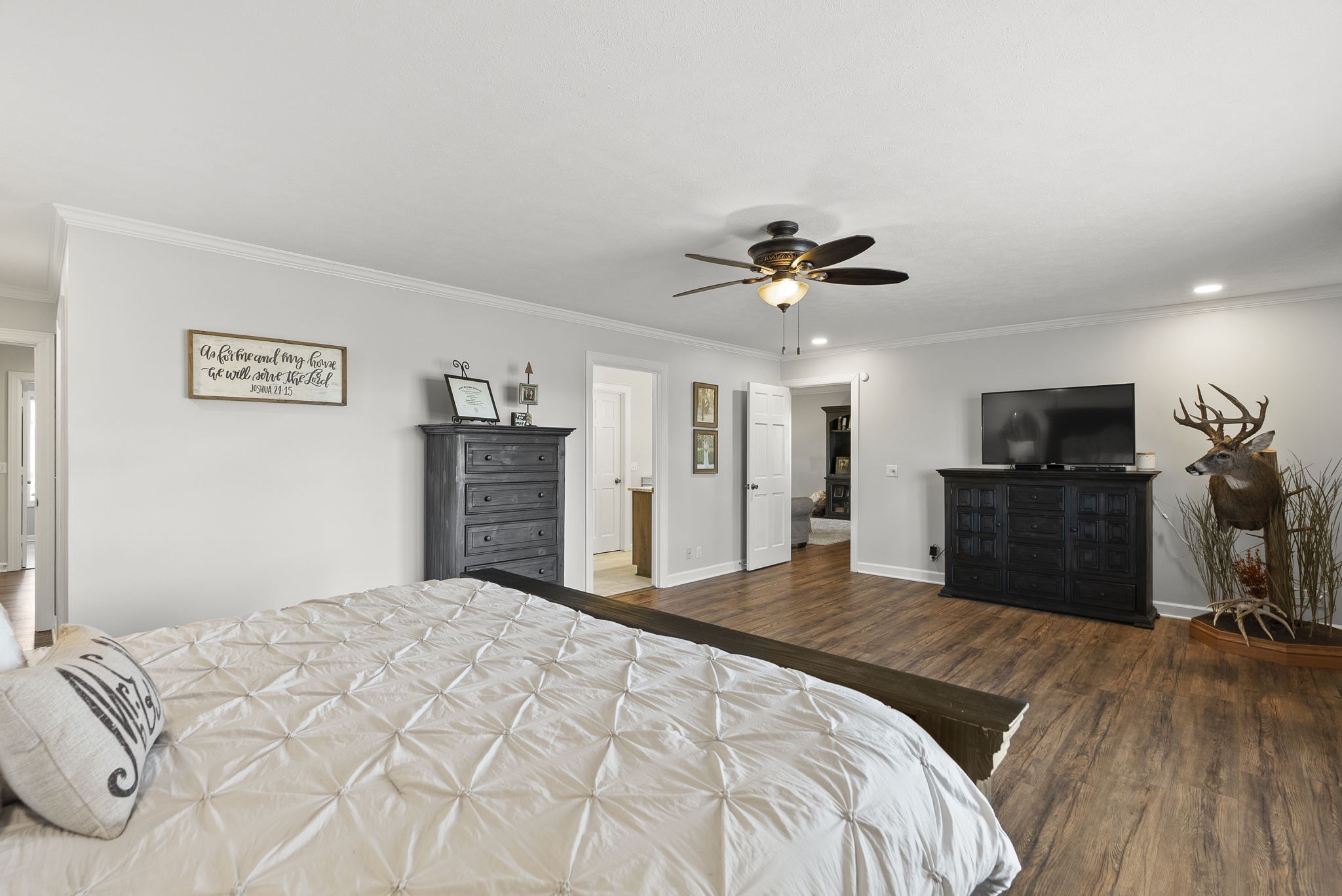 4767 Barren Plains Road Springfield, TN 37172 - Photo 35 of 68 a bedroom with a bed and a flat screen tv