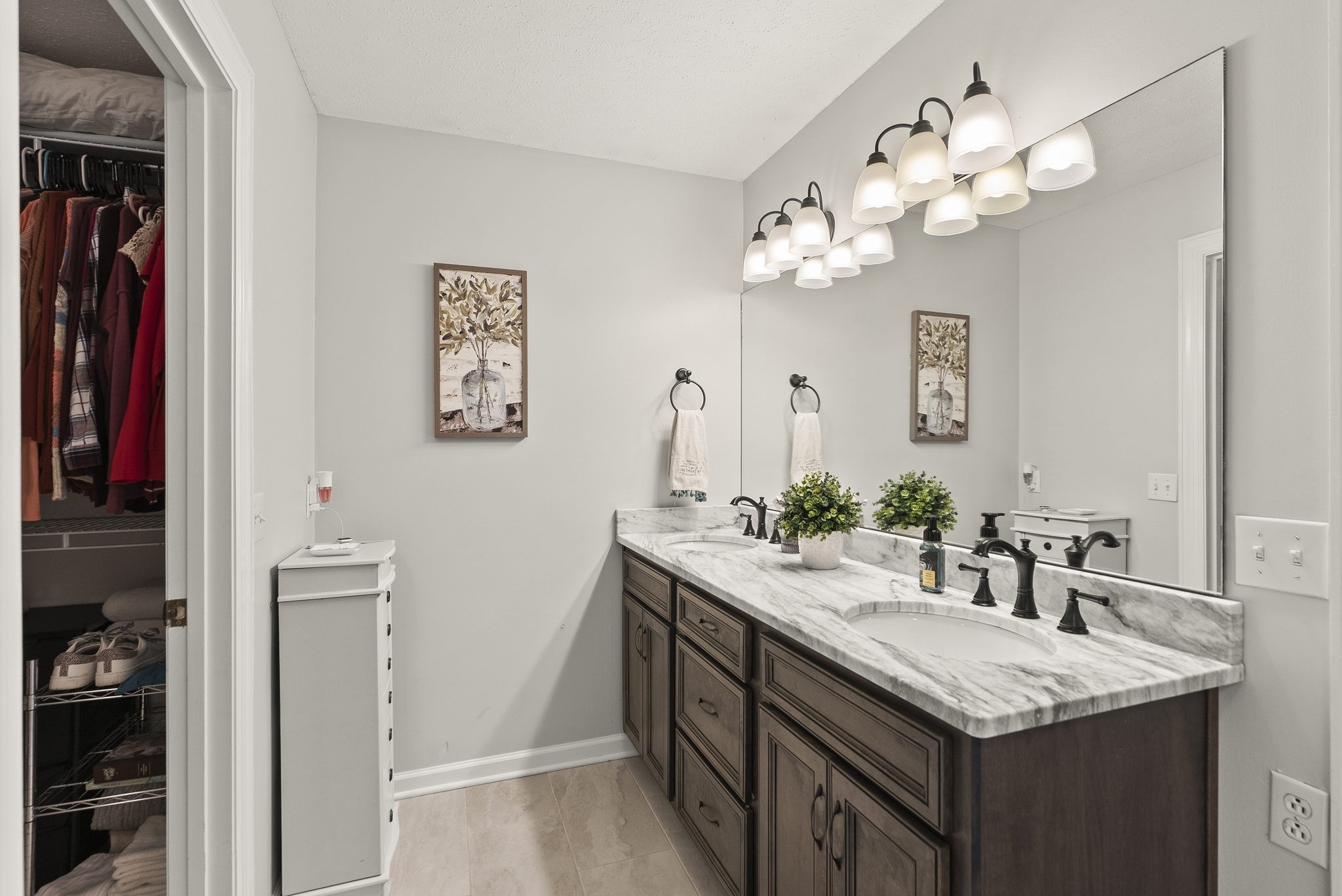 4767 Barren Plains Road Springfield, TN 37172 - Photo 38 of 68 a bathroom with a granite countertop sink a large mirror and a shower
