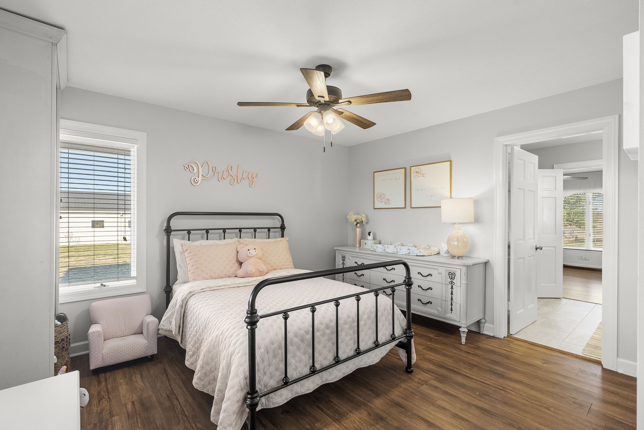 4767 Barren Plains Road Springfield, TN 37172 - Photo 41 of 68 a bedroom with a bed and a chandelier