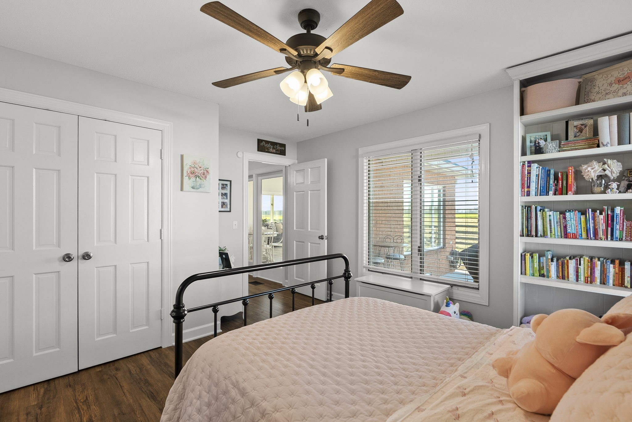 4767 Barren Plains Road Springfield, TN 37172 - Photo 42 of 68 a bedroom with a bed bookshelf and a window