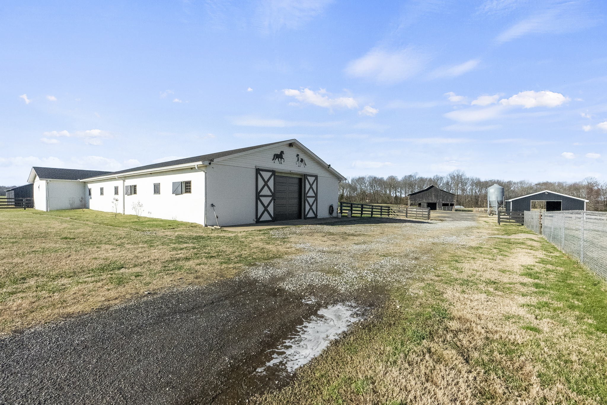 4767 Barren Plains Road Springfield, TN 37172 - Photo 48 of 68 a view of a house with backyard and a pond