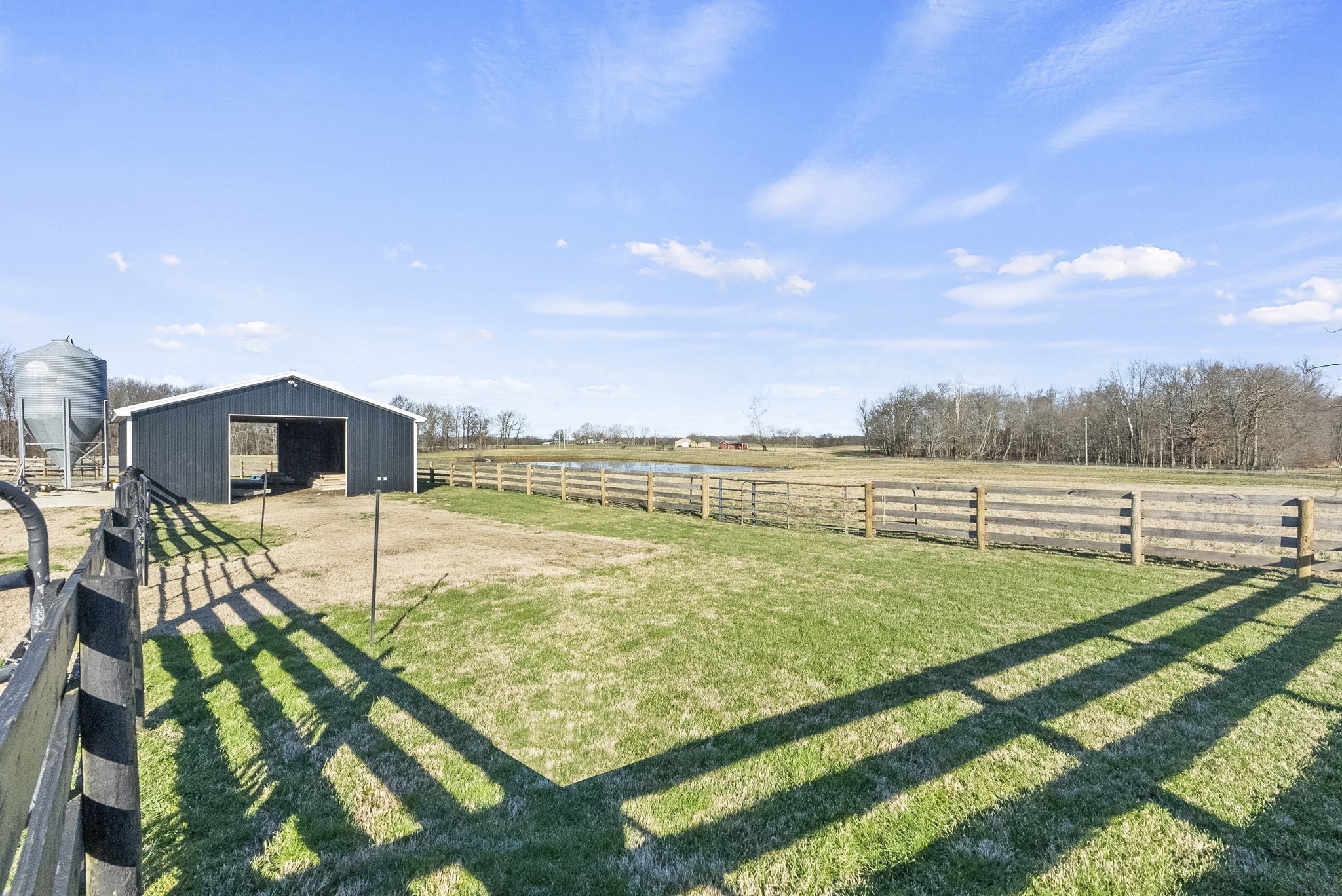 4767 Barren Plains Road Springfield, TN 37172 - Photo 50 of 68 a view of a swimming pool with an outdoor seating and a garden