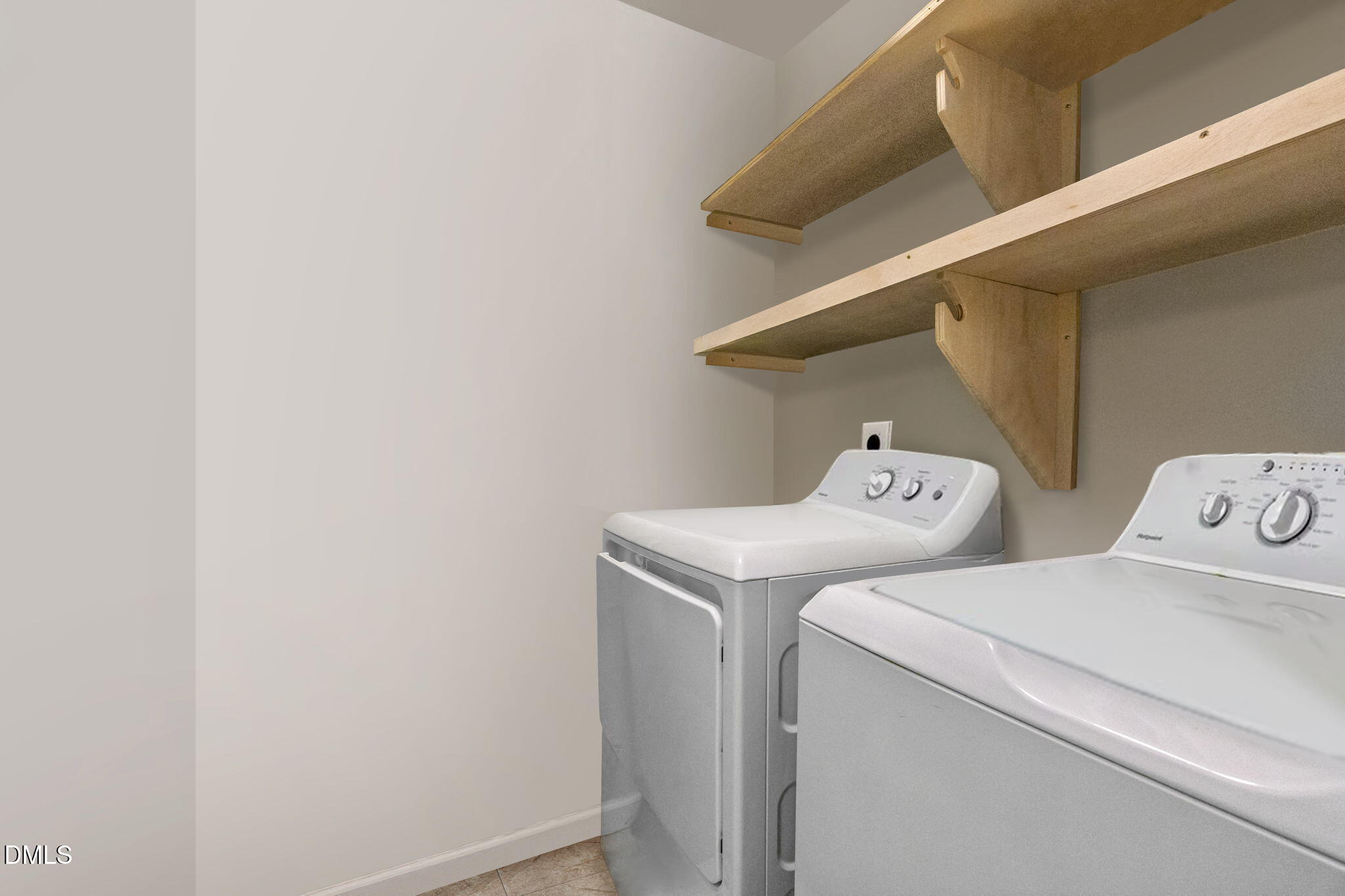 1021 Brighthurst Drive, Unit 103 Raleigh, NC 27605 - Photo 19 of 27 a utility room with dryer and washer