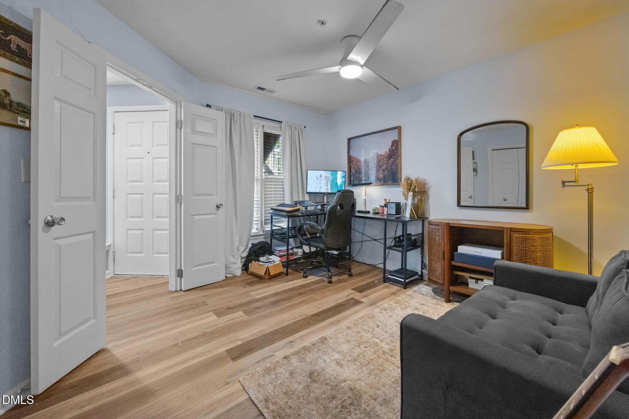 1021 Brighthurst Drive, Unit 103 Raleigh, NC 27605 - Photo 20 of 27 a view of a livingroom with furniture and a couch