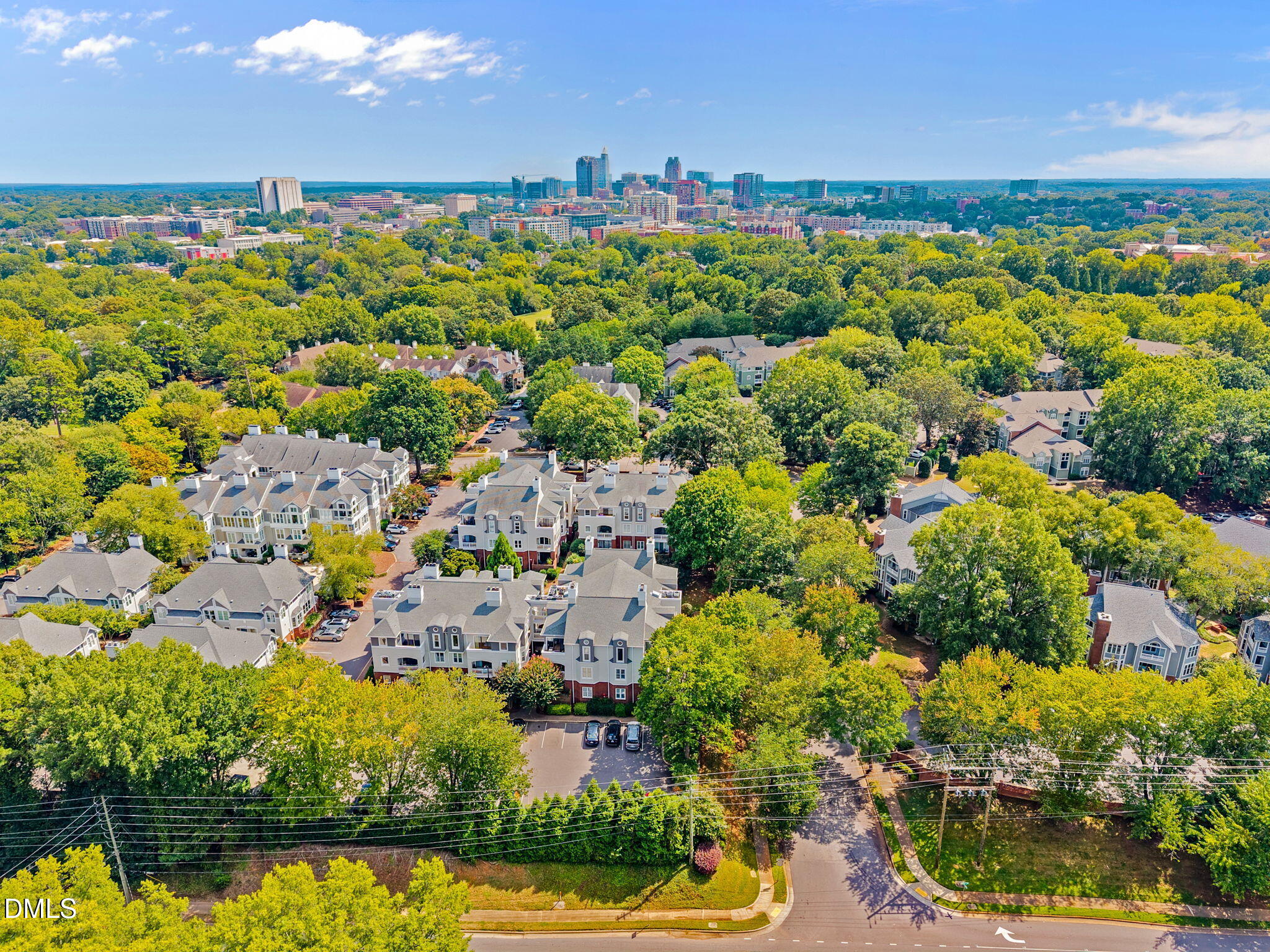 1021 Brighthurst Drive, Unit 103 Raleigh, NC 27605 - Photo 23 of 27 a view of a city with lots of trees