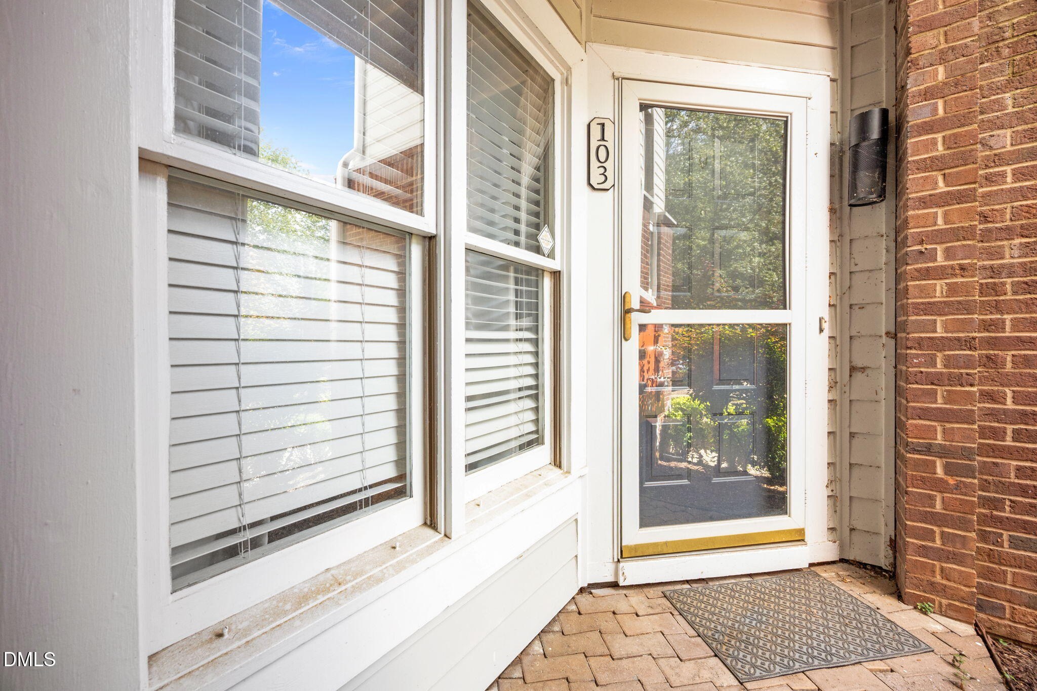 1021 Brighthurst Drive, Unit 103 Raleigh, NC 27605 - Photo 2 of 27 a view of a entryway door of the house