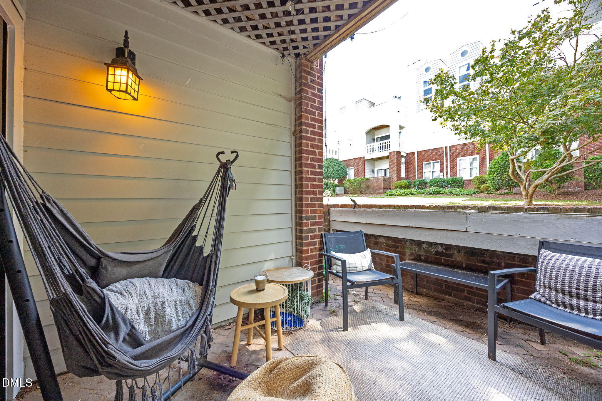 1021 Brighthurst Drive, Unit 103 Raleigh, NC 27605 - Photo 8 of 27 a view of two chairs in the balcony