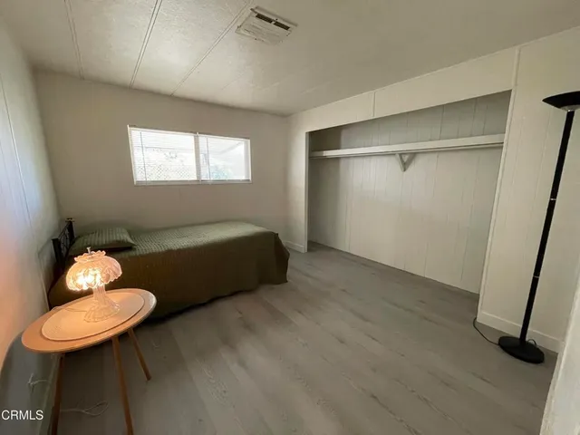 a room with furniture and a window