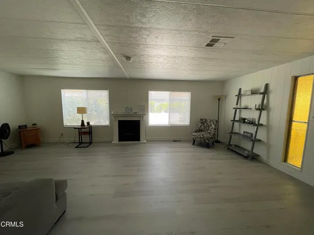 a view of a livingroom with a fireplace