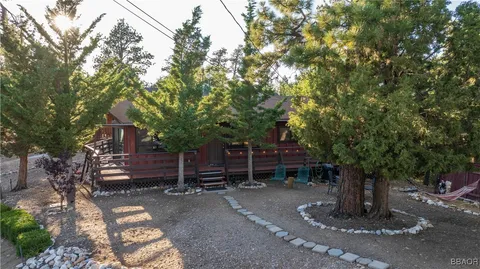 a view of a bench in a backyard