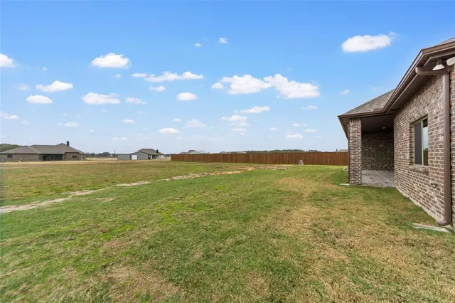 a view of an ocean from a yard